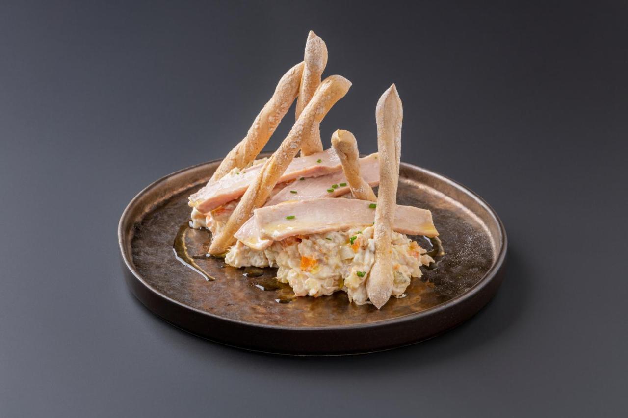 Eurostars Portico Аликанте Экстерьер фото A plate of chicken and potato salad